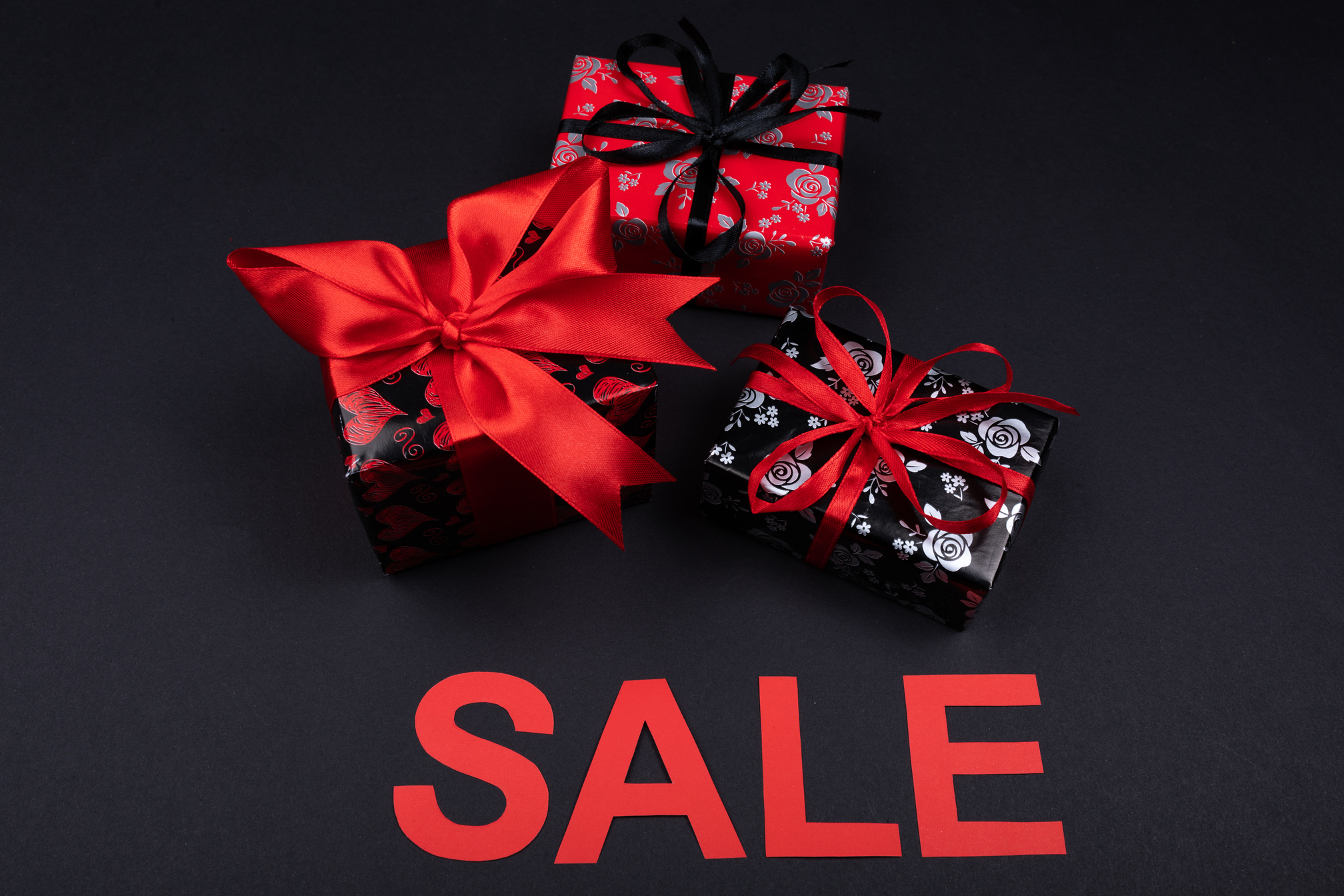 Red and Black Gifts on a Black Surface